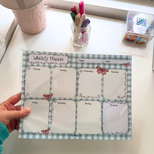 Butterfly Cottage Weekly Planner — Oops!
